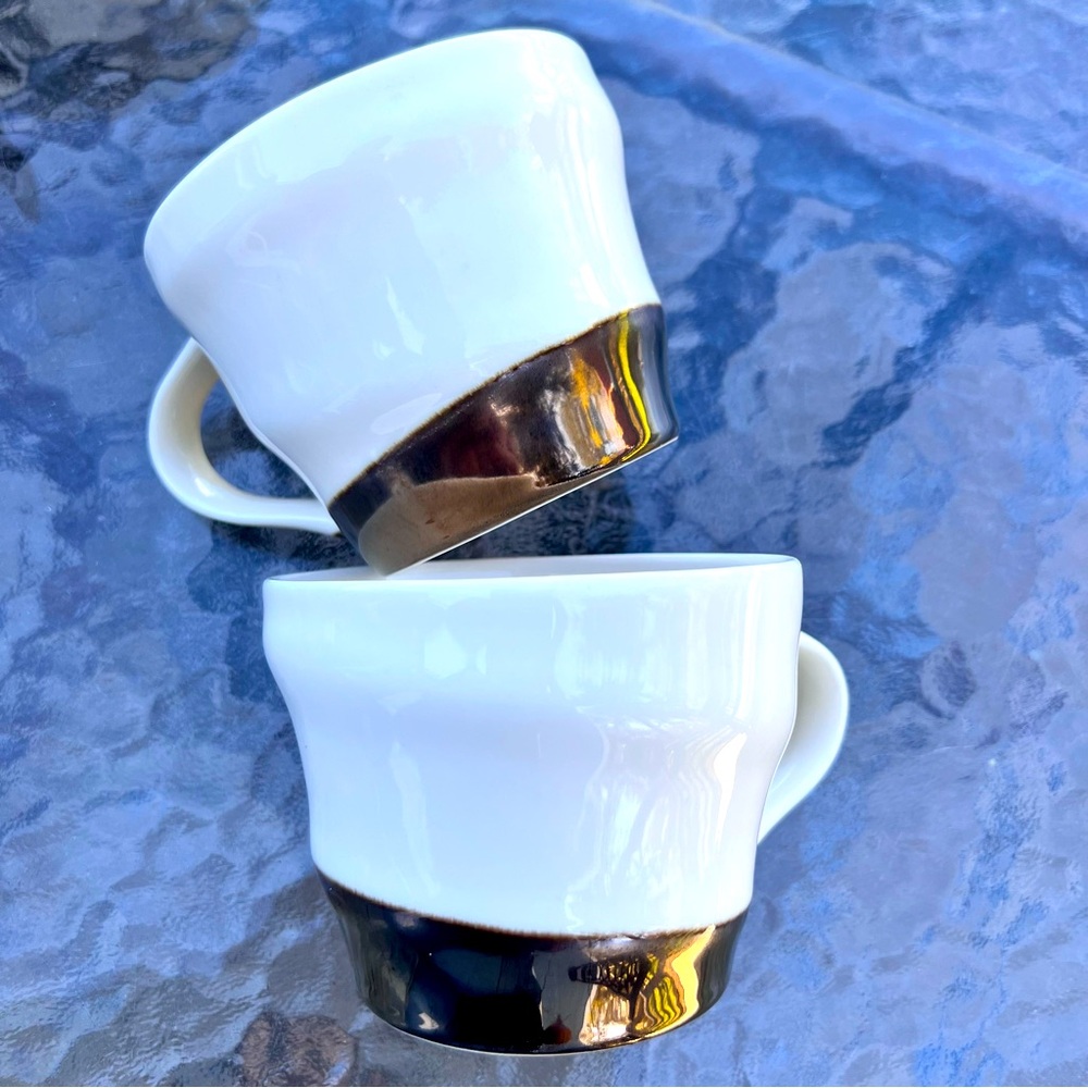 Starbucks 12 oz coffee cups.
